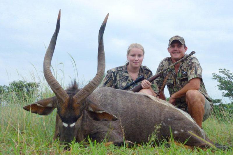 Hunters with a harvested Nyala trophy during a South Africa hunting safari with Mediate Expeditions
