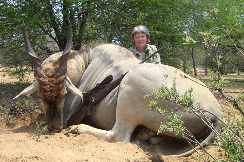 Hunter with trophy Eland during a South African plains game safari with Mediate Expeditions.